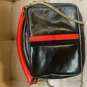 Clare v midi sac handbag with red suede stripe